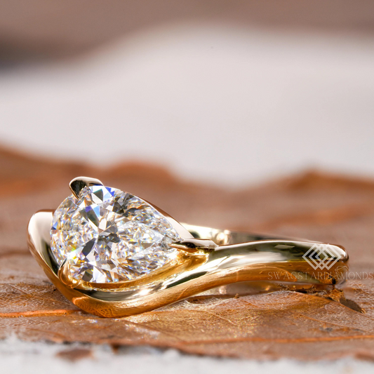 Pear Ring With Lab-Grown & Natural Diamonds, Jewelry By Leading Manufacturer From Swagstar, Surat. Explore Wedding, Engagement, Eternity Rings, Earring & Studs, Bracelets In 10k, 14k, & 18k Gold Varieties, Including White, Yellow, Rose Gold.