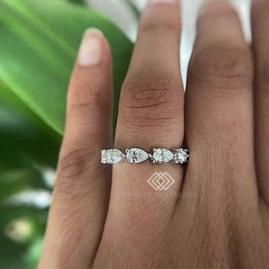 Pear Diamond Ring With Lab-Grown & Natural Diamonds, Jewelry By Leading Manufacturer From Swagstar, Surat. Explore Wedding, Engagement, Eternity Rings,  Earring & Studs, Bracelets In 10k, 14k, & 18k Gold Varieties, Including White, Yellow, Rose Gold.