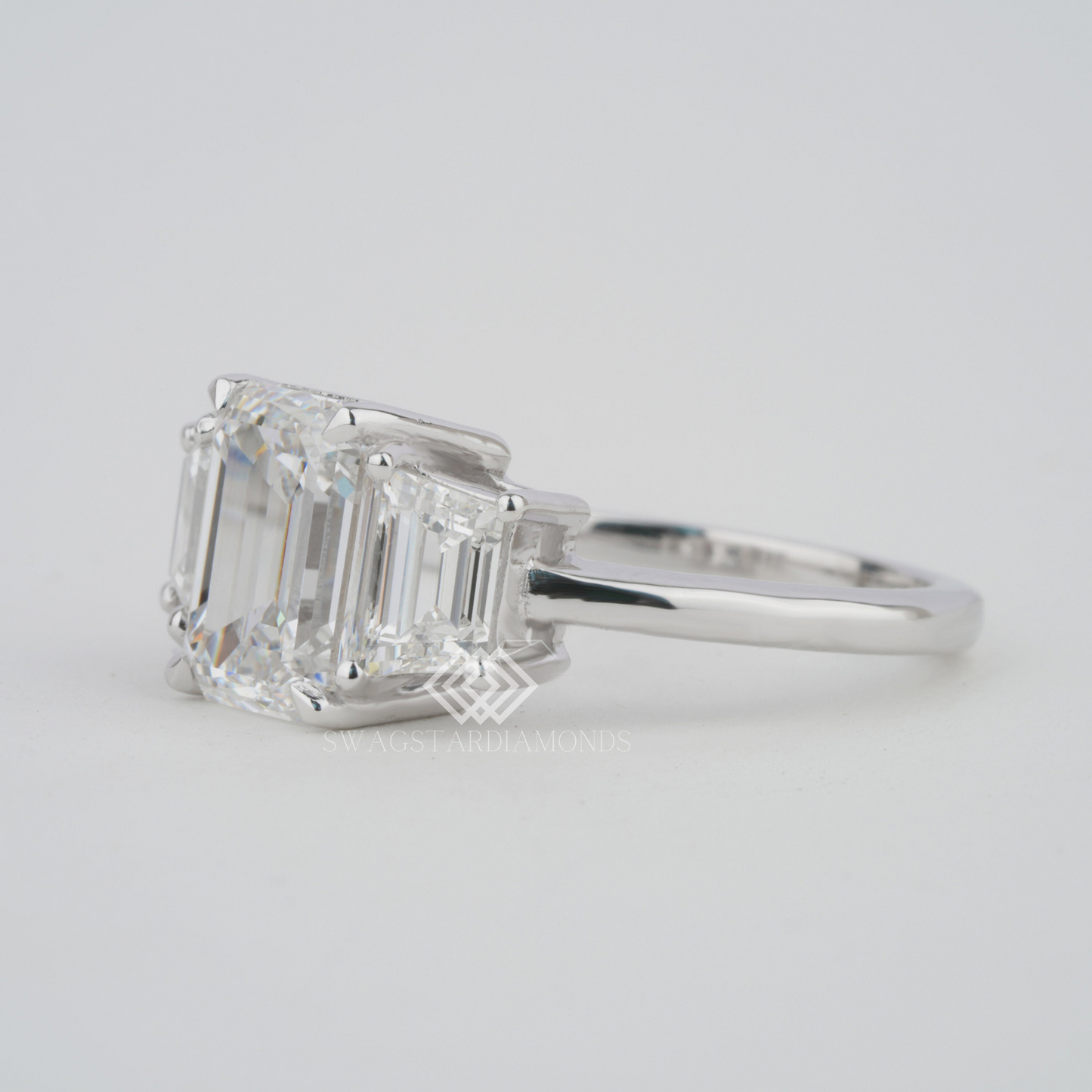 Emerald Cut Ring With Lab-Grown & Natural Diamonds, Jewelry By Leading Manufacturer From Swagstar, Surat. Explore Wedding, Engagement, Eternity Rings, Earring & Studs, Bracelets In 10k, 14k, & 18k Gold Varieties, Including White, Yellow, Rose Gold.