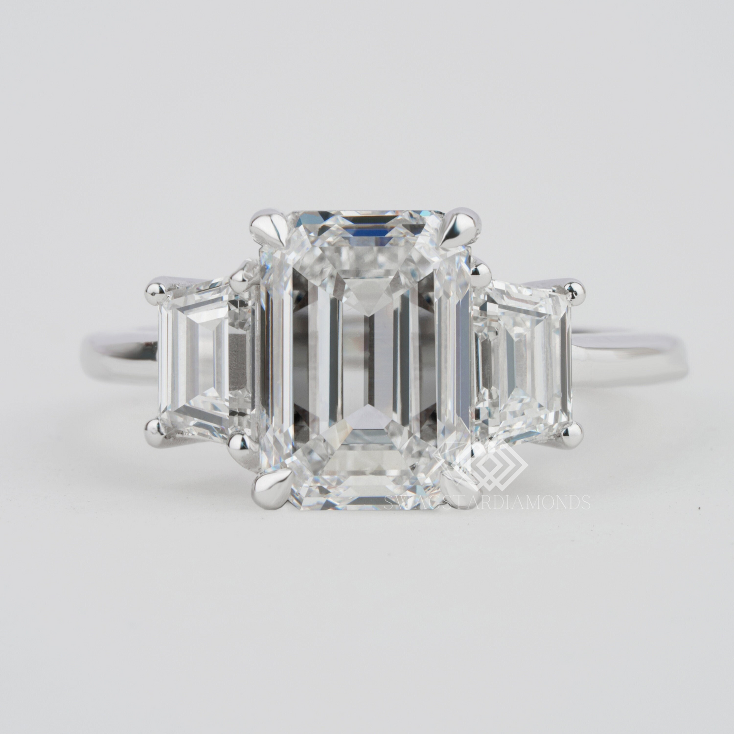 Emerald Cut Ring With Lab-Grown & Natural Diamonds, Jewelry By Leading Manufacturer From Swagstar, Surat. Explore Wedding, Engagement, Eternity Rings, Earring & Studs, Bracelets In 10k, 14k, & 18k Gold Varieties, Including White, Yellow, Rose Gold.