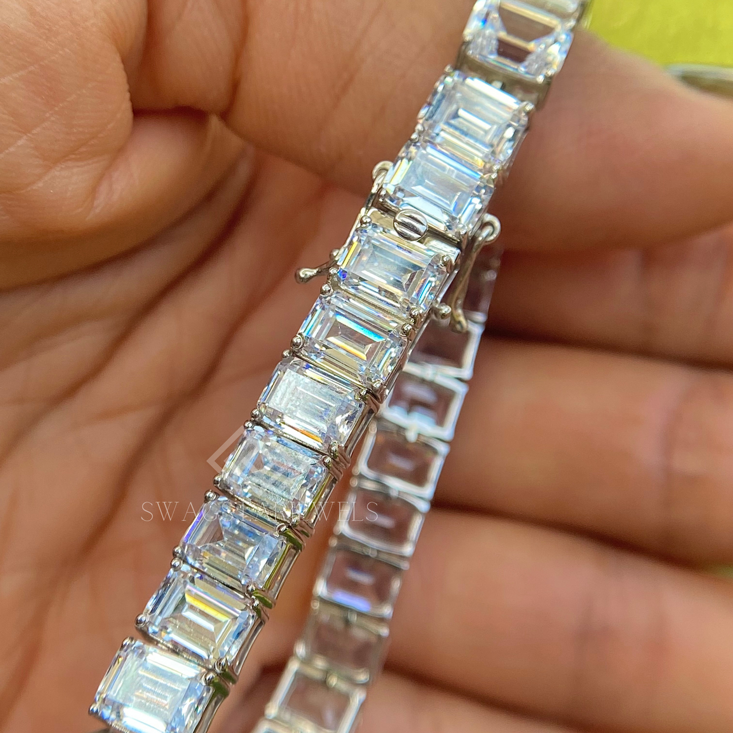 Emerald Cut Bracelet With Lab-Grown & Natural Diamonds, Jewelry By Leading Manufacturer From Swagstar, Surat. Explore Wedding, Engagement, Eternity Rings,  Earring & Studs, Bracelets In 10k, 14k, & 18k Gold Varieties, Including White, Yellow, Rose Gold.