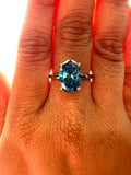 Blue Oval Cut Hidden Halo Ring