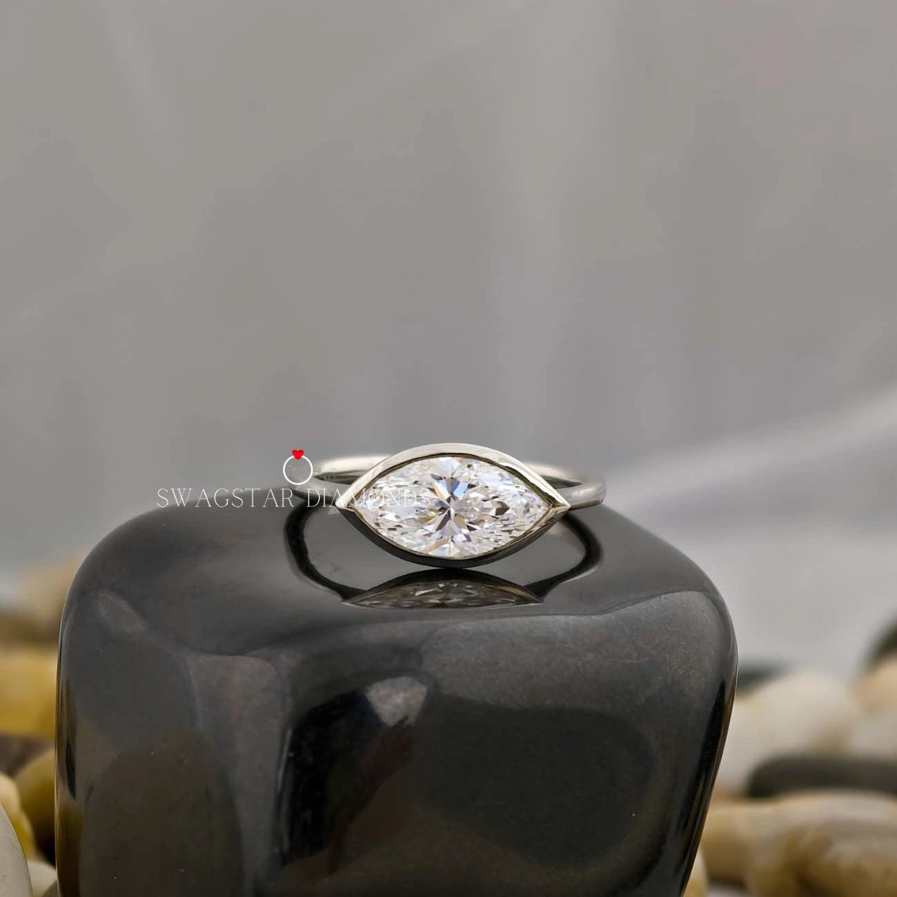 Marquise Cut East West Bezel Set