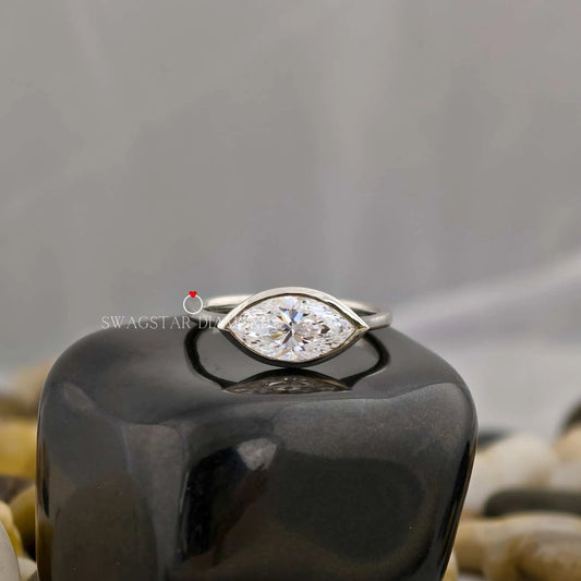 Marquise Cut East West Bezel Set