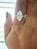 Marquise Cut Side Accents Round Diamond Ring