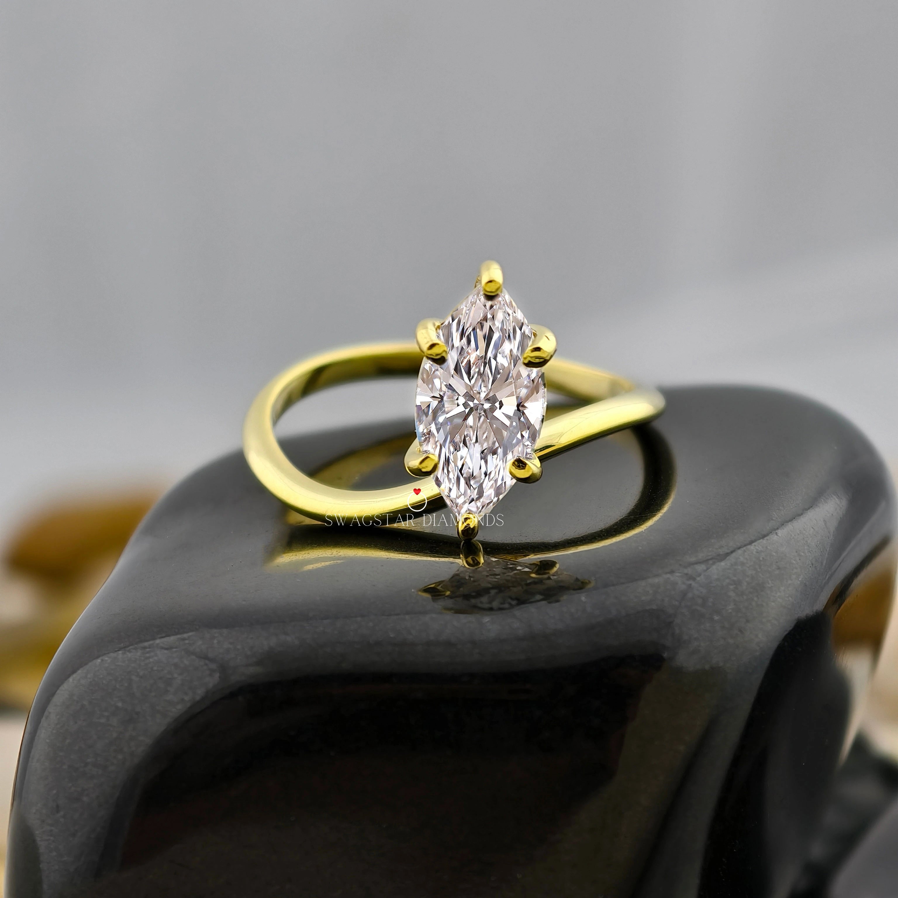 Marquise Cut Tension Setting Solitaire Ring