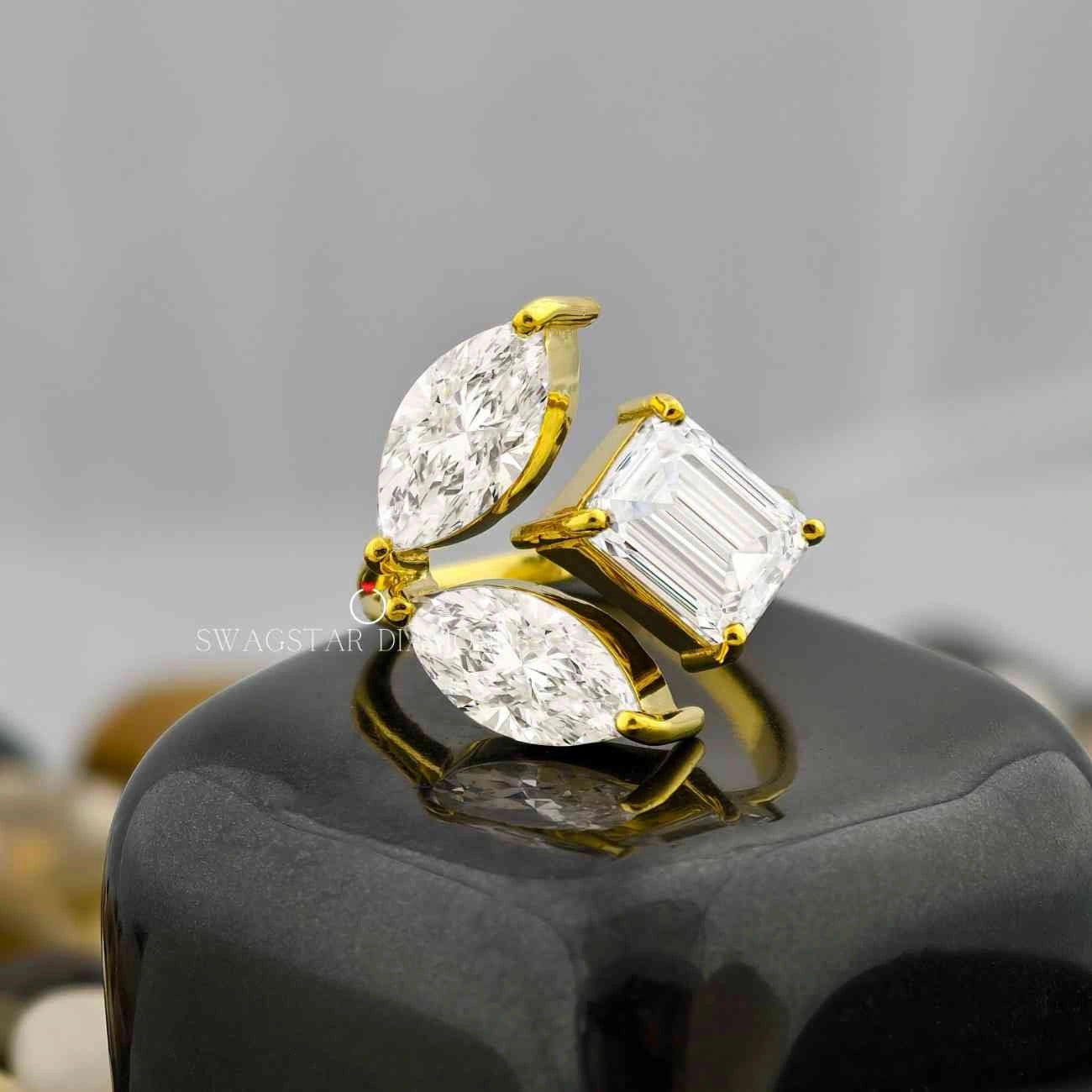 Marquise Emerald Cut Three Stone Ring 
