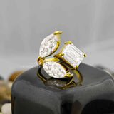 Marquise Emerald Cut Three Stone Ring 
