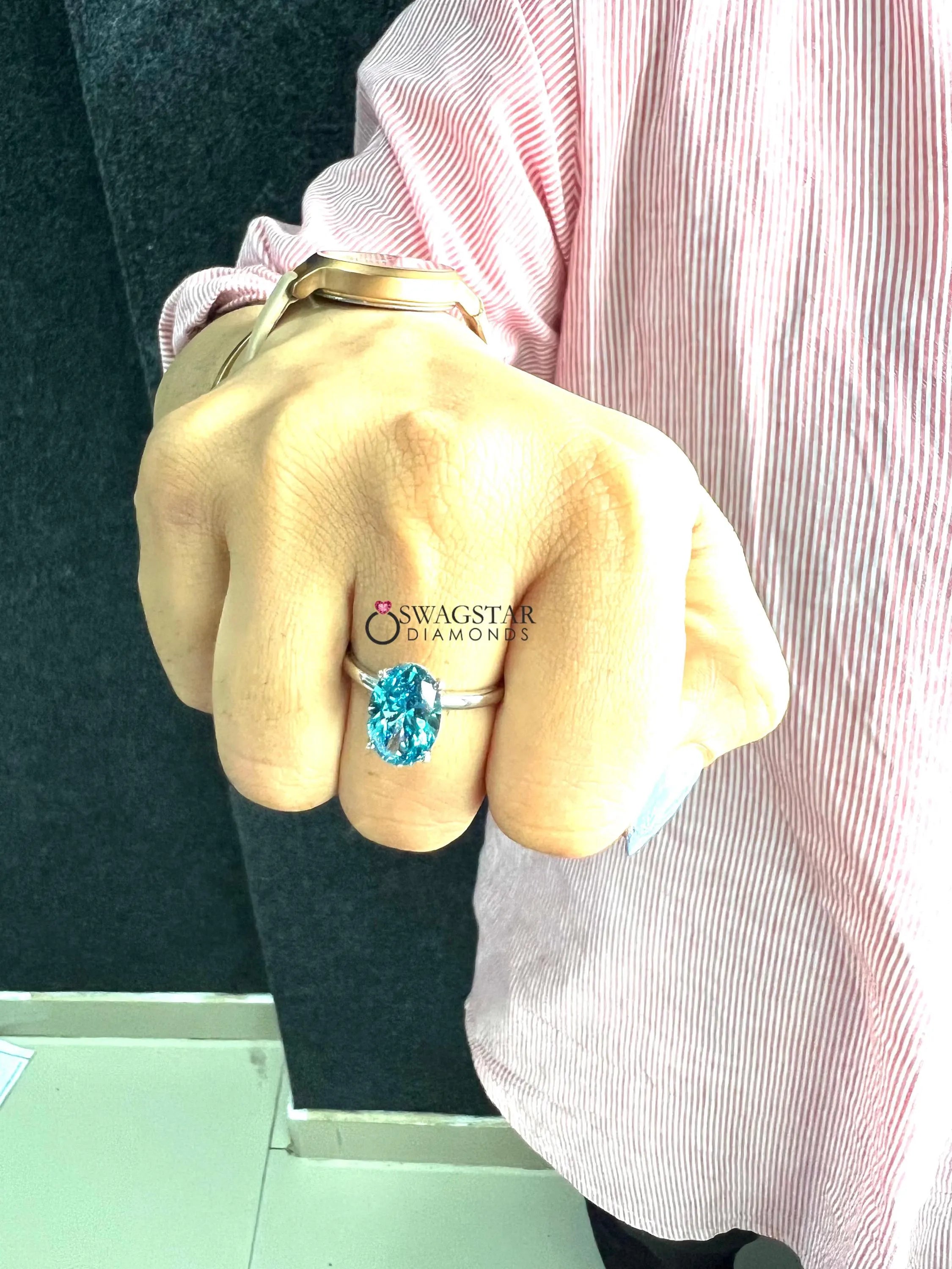 Oval Cut Vivid Blue Hidden Halo Wedding Ring