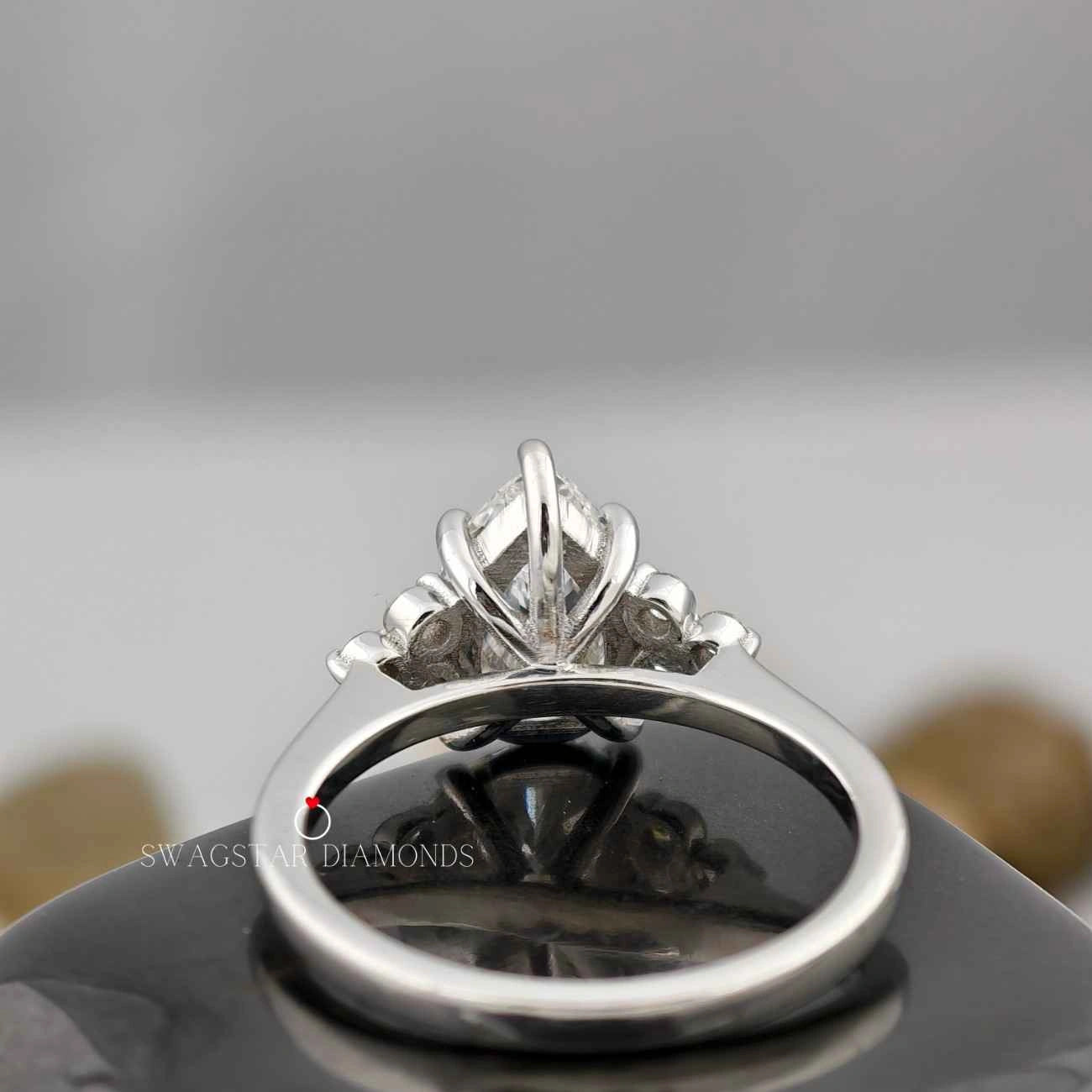 Pear And Round Diamond Accents Ring