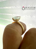 Pear Cut Solitaire Diamond Ring.