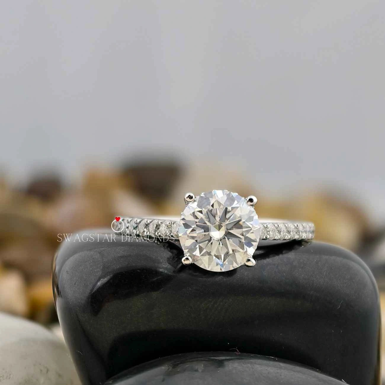 Round Cut Bridge Style Solitaire Ring 