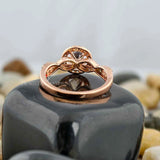 Twisting Split Shank Halo Engagement Ring