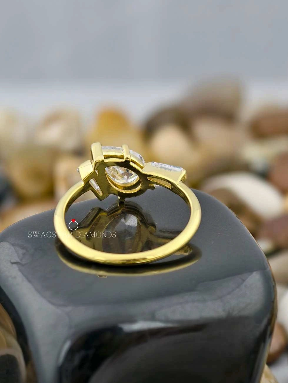 Unique Pear Cut Three Stone Ring