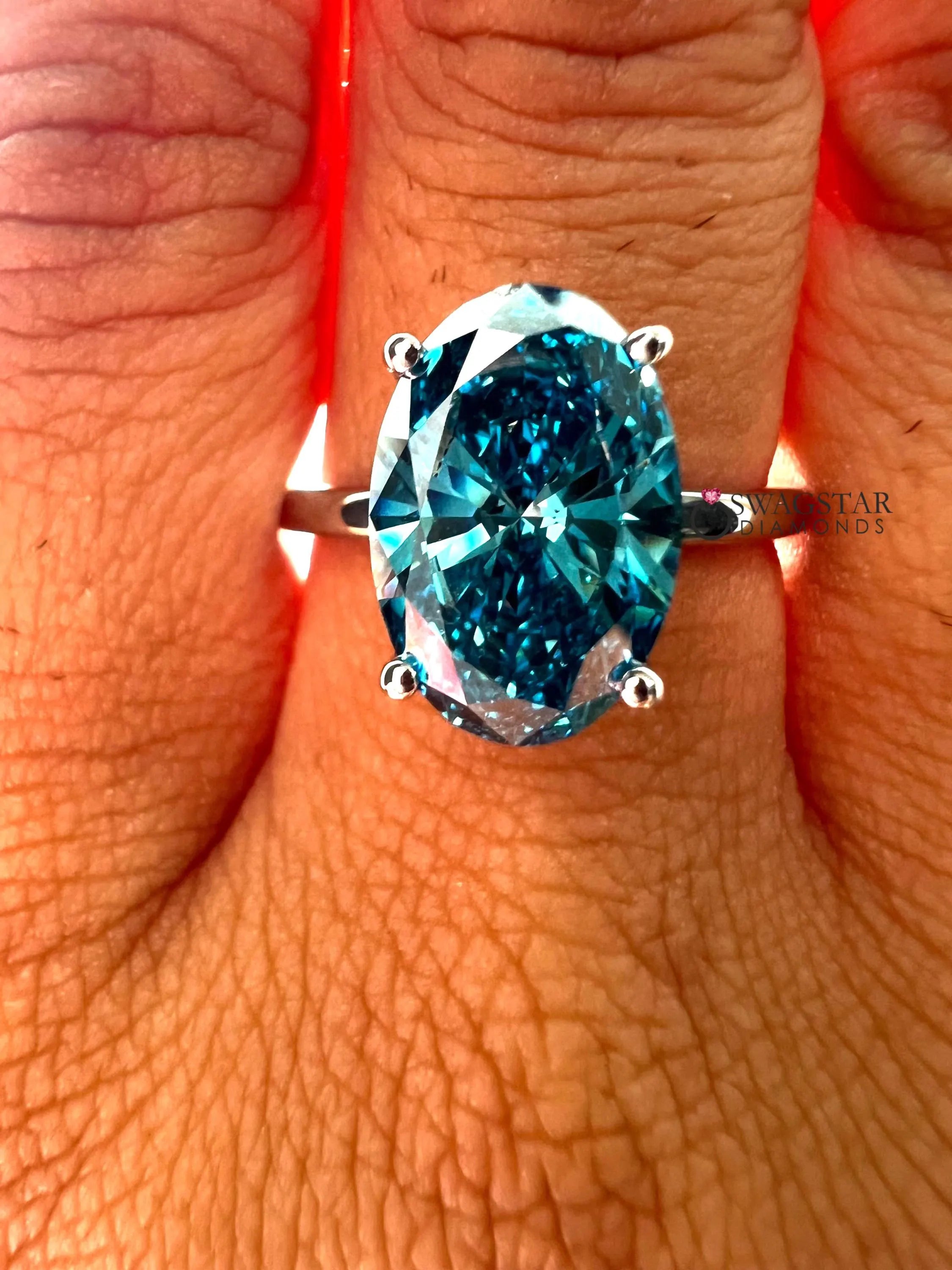 Vivid Blue Oval Cut Lab Grown Engagement Ring