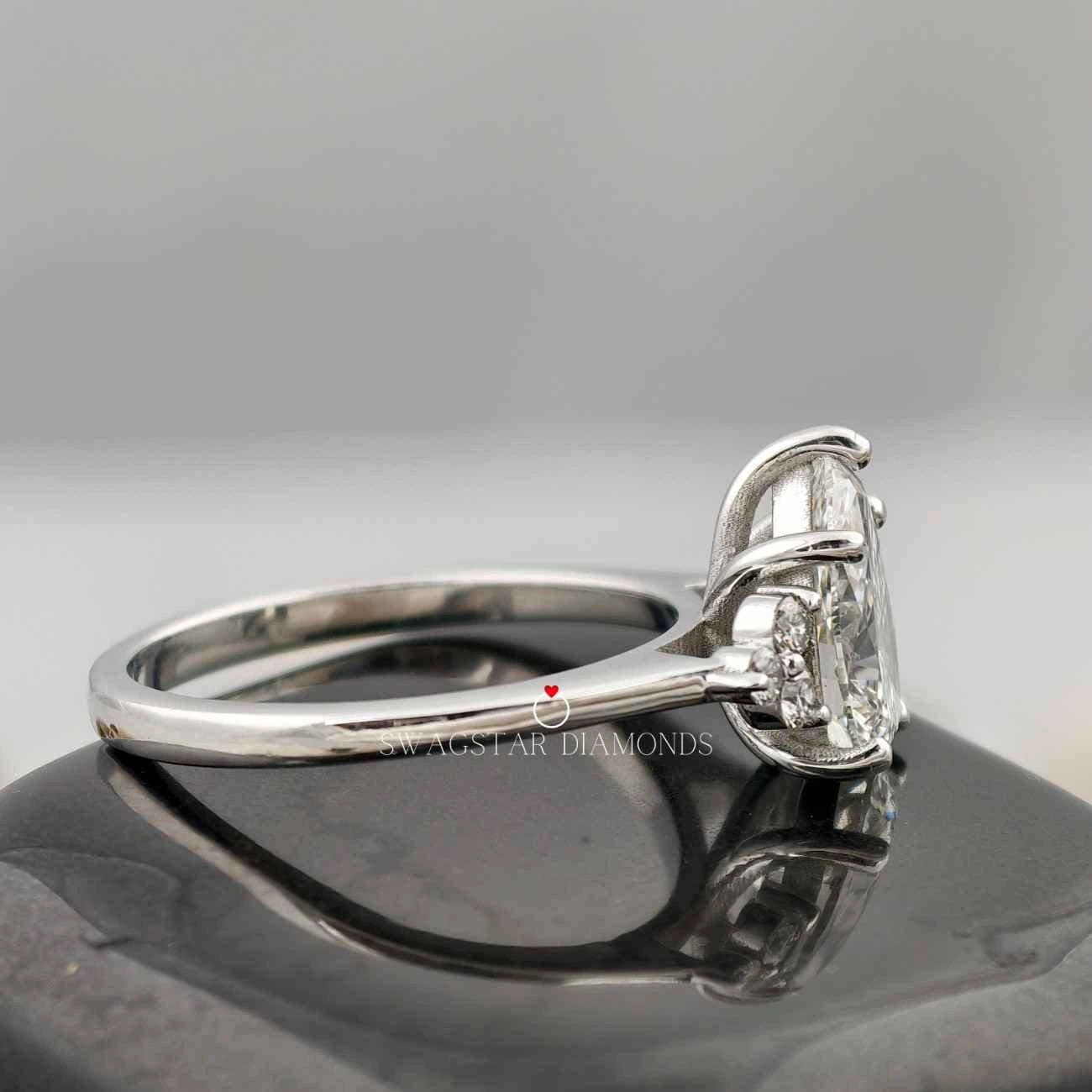 cluster style pear engagement ring 
